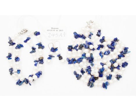 A Freshwater Pearl and Lapis Lazuli double strand necklace, with alternating pearls and lapis lazuli chips, the pearls of app