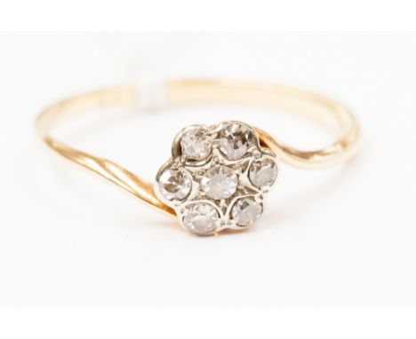 A diamond cluster ring