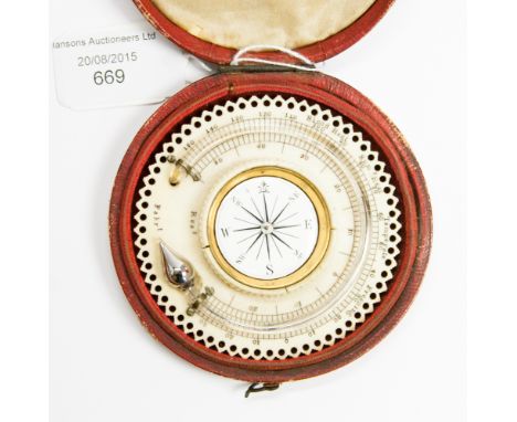 A late 19th Century cased ivory portable thermometer/compass combined.