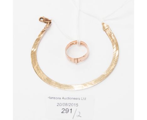 A 9ct rose gold buckle ring 8.9 gms, together with a Italian 9ct gold fine flat link bracelet, 4.3 gms approximately. (2)