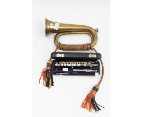 A modern cased Buescher of USA silver plated C piccolo, model no. 27862, together with a brass bugle with twisted rope and ta