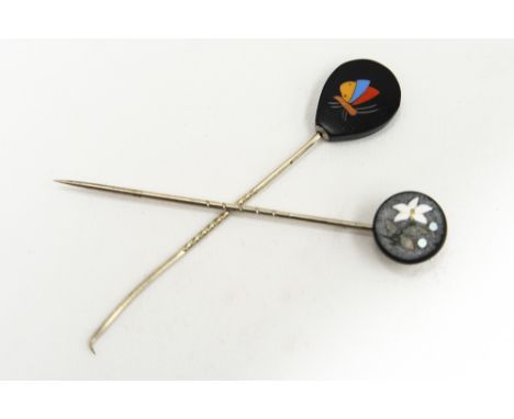 Two Ashford marble stick pins, late nineteenth century (2)