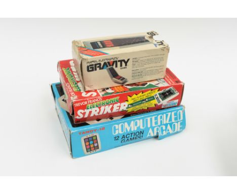 A Mattel electronic game - Gravity Electronic Striker Trevor Francis Tandy 12 computerised arcade 12 games in one.