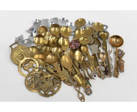A collection of brass caddy spoons, etc.