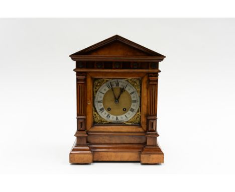 A late Victorian walnut bracket clock of architectural form, gilt dial (key and pendulum) 