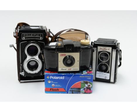 A Rolleiflex T75 mm  3.5 Tessar camera and three others (4)