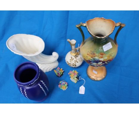 A Royal Worcester ivory pitcher, enamelled with gold, with a horn of plenty, etc (7) 