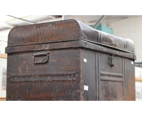 An early 20th Century tin trunk.
