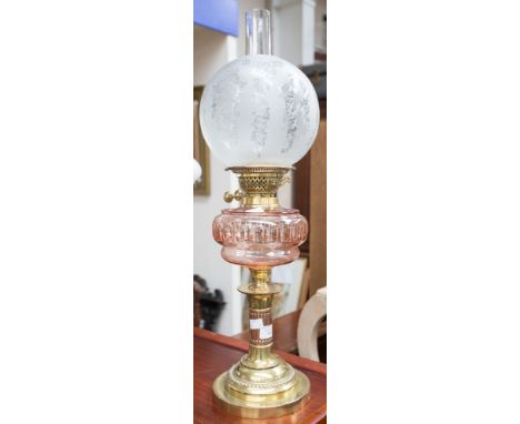A Victorian brass oil lamp (shade s.d) 