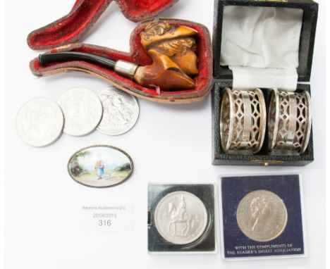 A silver Festival of Britain crown 1951 and enamel on copper brooch front, a pair of EPNS boxed napkin rings, a late 19th Cen