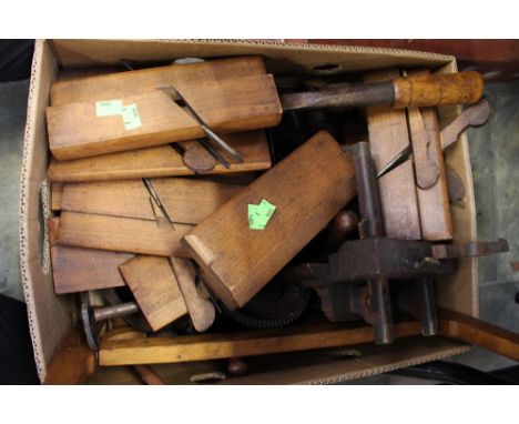 A collection of wooden vintage tools, mostly plains 