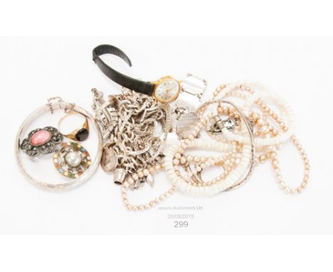  A white metal charm bracelet, sterling bangle, three various rings, etc wristwatch 