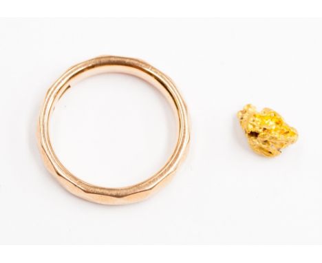 A 9ct gold ring, together with a gold nugget, ring 2.5g, nugget 0.8g. (2)