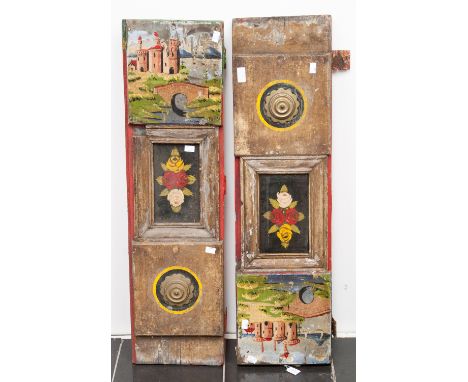 Canal interest, a pair of Bargeware wooden door panels, circa 1900, with roundel and brightly painted detail; together with a