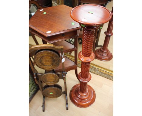A collection of furntiure comprising a woolwork firescreen, folding two tier cake stand, hexagonal plant stand and turned tor