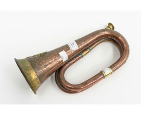 A 19th / 20th century copper and brass mounted bugle