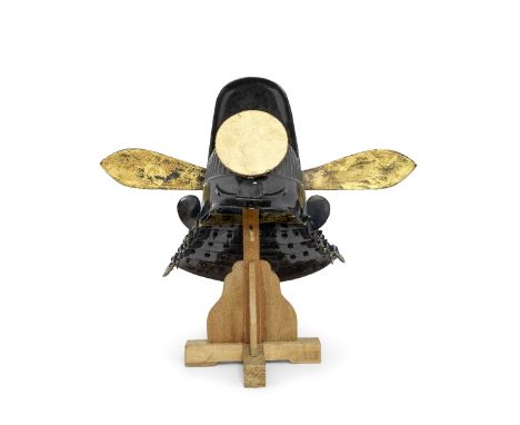 A TOKANMURI KABUTO (HELMET)Edo period (1615-1868), probably 18th centuryThe iron bowl with a black-lacquered ribbed surface, 