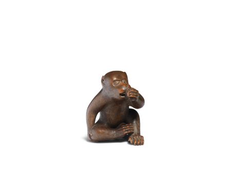 MASAKIYO OF YAMADA, ISE PROVINCEA Wood Netsuke of a Monkey Edo period(1615-1868) or Meiji era (1868-1912), mid/late 19th cent