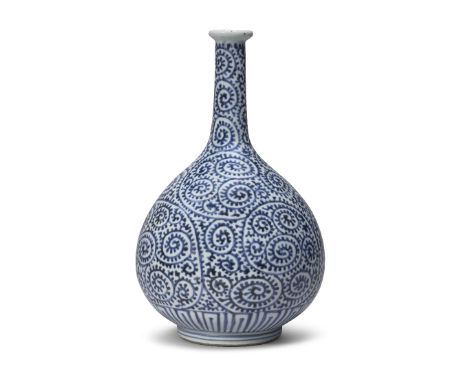 A KO-IMARI TOKKURI (SAKE BOTTLE)Edo period (1615-1868), late 18th centuryThe bulbous body decorated all over in underglaze bl