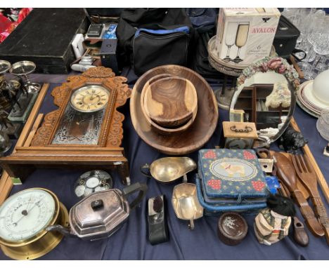 A carved mantle clock together with a brass cased barometer, electroplated wares, wooden bowls, easel mirror, carved bear etc