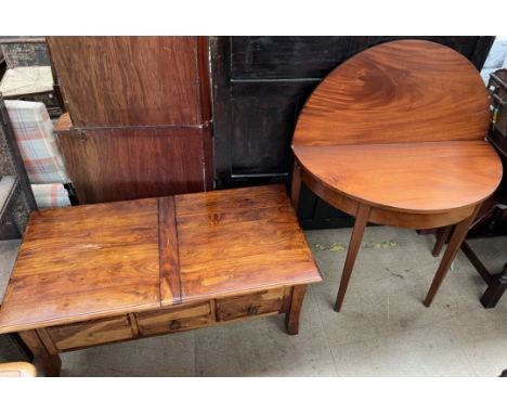 A late 19th century mahogany tea table together with a hardwood trunk / coffee table 