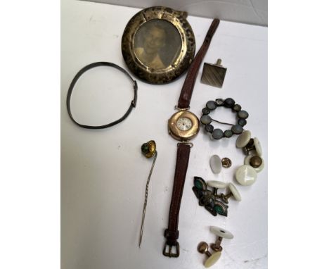 A 9ct gold half hunter wristwatch together with a silver photograph frame, stick pin, brooches etc 