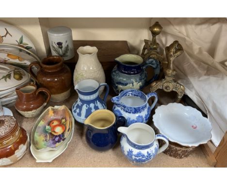 A Belleek porcelain vase together with A Doulton Lambeth jar and cover, various jugs, brass andirons, Royal Worcester serving