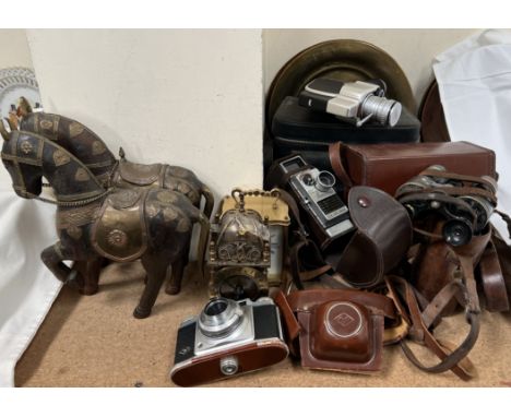 A Bell &amp; Howell 624EE cine camera together with another cine camera, Agfa 35mm camera, a pair of binoculars, two clocks, 