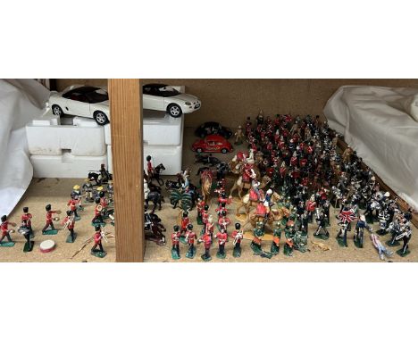 A large collection of lead soldiers mainly band players together with Corgi cars etc 