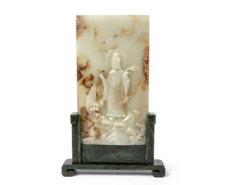 PALE CELADON JADE CARVING OF GUANYIN TABLE SCREEN QING DYNASTY, 18TH-19TH CENTURY the screen tablet carved in high relief wit