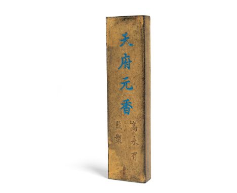 GILDED INK STICK QING DYNASTY  one side carved with a pair of mirrored-image dragons chasing a flaming pearl above crashing w