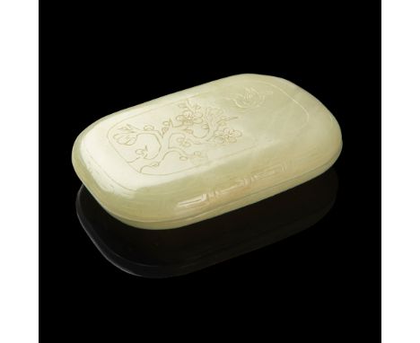 CELADON JADE BOX WITH COVER QING DYNASTY, 19TH CENTURY of rounded rectangular form, the cover incised in framed panel with a 