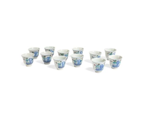 GROUP OF TWELVE DOUCAI CUPS GAUNGXU MARK each of inverted-bell form, each painted to the exterior with underglaze blue stylis