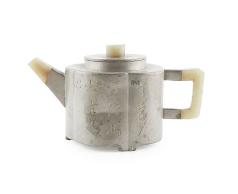 PEWTER ENCASE AND JADE MOUNTED YIXING STONEWARE TEAPOT QING DYNASTY, 19TH CENTURY of cylindrical lobed shape standing on thre