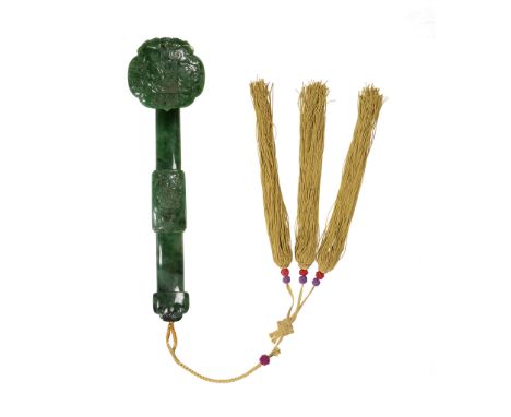 SPINACH-GREEN JADE RUYI SCEPTRE QING DYNASTY, 19TH CENTURY the curved sceptre with a characteristic ruyi-shaped head further 
