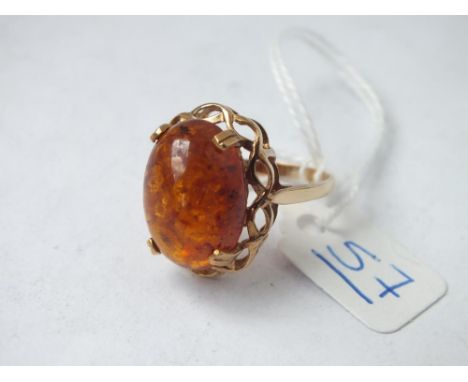 A large 9ct fancy amber ring - size R - 4.2gms