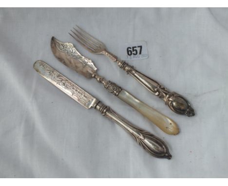 Butter knife and a child's spoon and fork