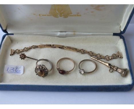 A box of assorted odd jewellery - rings, stick pins etc