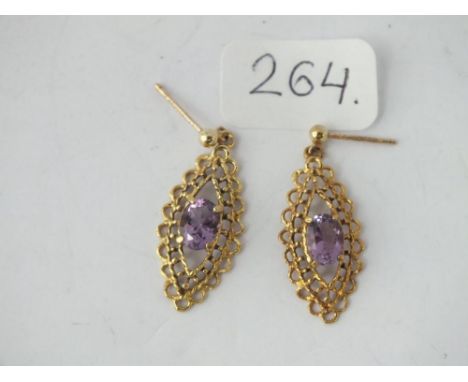 A pair of 9ct oval amethyst drop earrings - 2.5gms