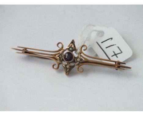 A Victorian pearl &amp; amethyst bar brooch set in gold