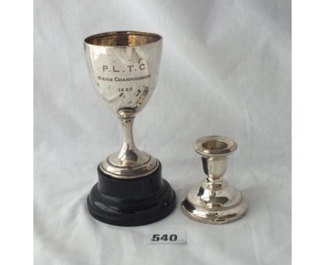 A trophy cup on wood plinth &amp; a beaded edge candle stick - 46gms weighable 