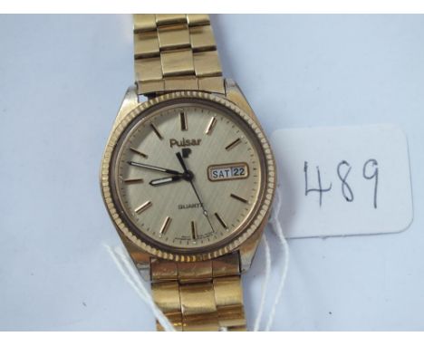 A gents PULSAR quartz with seconds sweep &amp; calander dial 