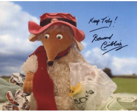 The Wombles. 8x10 photo signed by actor Bernard Cribbins who was narrator for the series. Good condition. All autographs come
