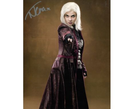 Harry Potter 8x10 movie photo signed by actress Natalia Tena who was Nymphadora Tonks in the films. Good condition. All autog