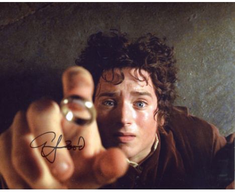 Lord of the Rings 8x10 photo signed by actor Elijah Wood who played Frodo Baggins in the movies. Good condition. All autograp