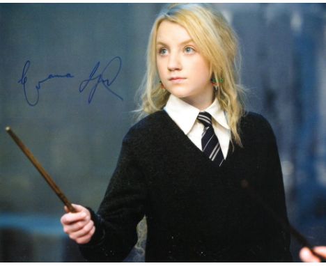 Harry Potter 8x10 movie photo signed by actress Evanna Lynch who was Luna Lovegood in the films. Good condition. All autograp