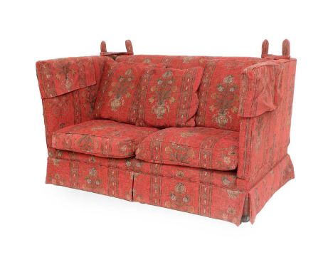 A Knole-Style Two-Seater Drop-End Sofa, modern, covered in red and gold floral fabric, with four scatter cushions and two fea