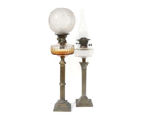 A Victorian Brass Based Oil Lamp, with frosted globular shade, cut glass reservoir and reeded column base78cm overallA Simila