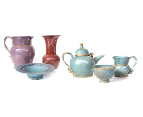 Tobias Harrison (b. 1950): a purple lustre glazed studio pottery jug with entwined gilt ribbon handle, signed and numbered27c