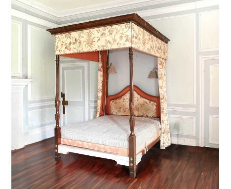 A George III-Style Carved Mahogany Four-Poster Bed, 19th century in part, with later cream crewel-style pelmet and curtains b